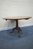 A REPRODUCTION CHERRYWOOD CIRCULAR BREAKFAST TABLE, on turned support and three cabriole legs,