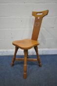 COLIN 'BEAVERMAN' ALMACK, AN ENGLISH OAK COTTAGE CHAIR, cresting rail with pierced handle, the