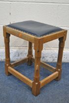 PETER 'RABBITMAN' HEMP OF WETWANG, AN ENGLISH OAK JOINT STOOL, with dark blue leather studded