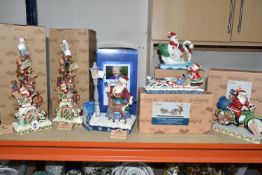 SIX BOXED JIM SHORE 'HEARTWOOD CREEK' CHRISTMAS FIGURINES, comprising two illuminated 'Heaped With