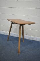 AN ERCOL ELM AND BEECH MODEL 265 TABLE EXTENDER, the rounded top on three tapered legs, united by