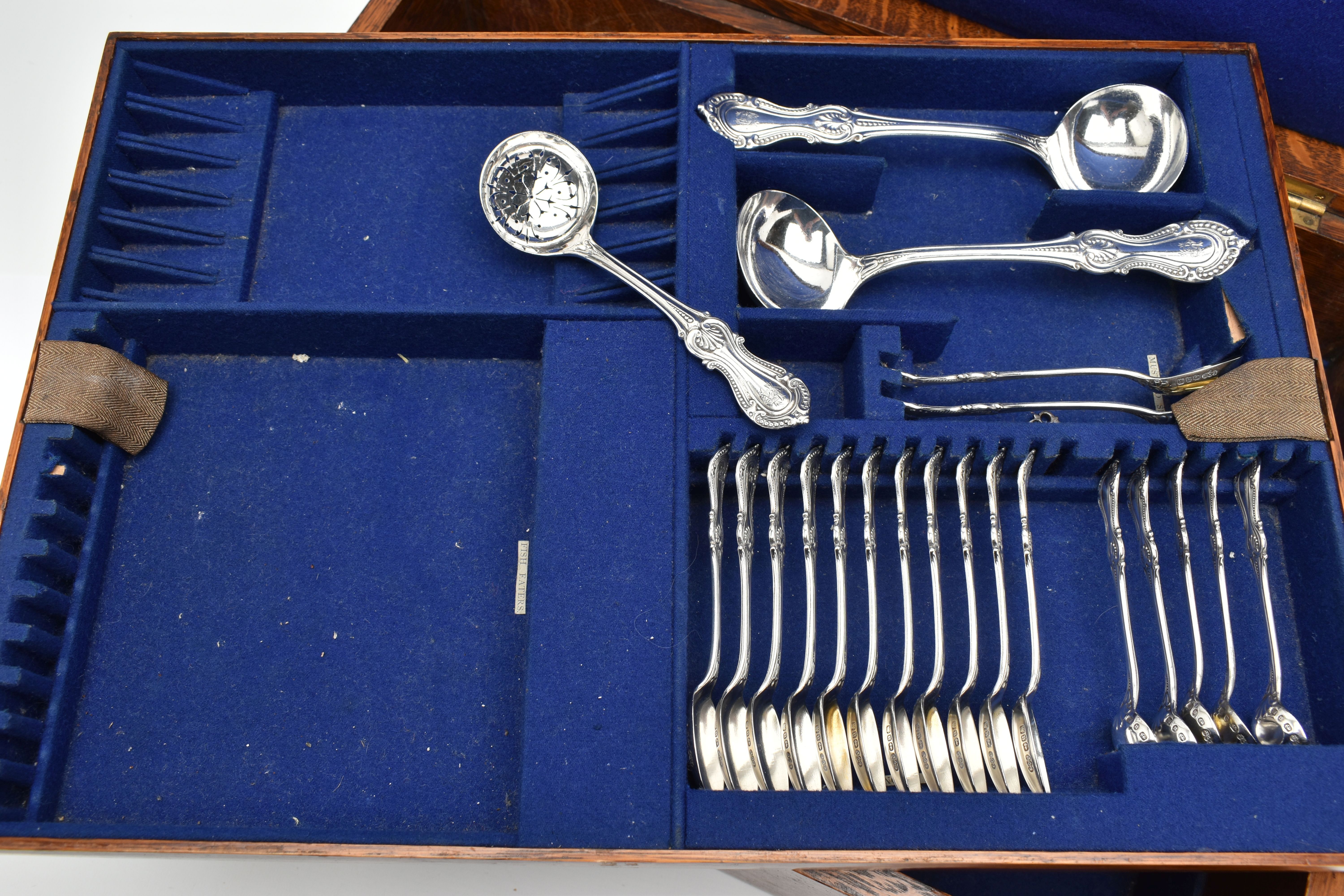 A LATE 19TH CENTURY OAK CASED THREE TIER CANTEEN OF LATE 19TH AND EARLY 20TH SILVER FLATWARE BY - Image 6 of 12