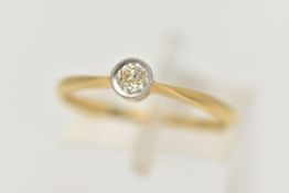 A DIAMOND SINGLE STONE RING, an old cut diamond collet set with milgrain detail, leading on to a