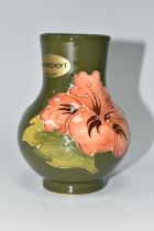 A MOORCROFT POTTERY CORAL HIBISCUS VASE, of bulbous necked form, tube lined in Coral Hibiscus