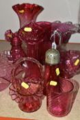 A GROUP OF CRANBERRY GLASS, comprising three frilled edge bowls, a small basket, tumbler (