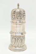 A LATE VICTORIAN SILVER SUGAR CASTER, cylindrical form with embossed foliate and scroll pattern,