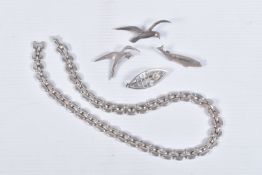 AN ASSORTMENT OF SILVER AND WHITE METAL JEWELLERY, to include a silver bird brooch, hallmarked '