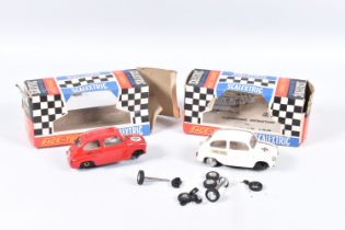 TWO BOXED VINTAGE SCALEXTRIC RACE TUNED FIAT 600 CARS, No.C99, one in red red with RN20, the other
