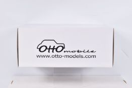A BOXED OTTO MOBILE MODELS MG METRO 6T4 DIECAST MODEL VEHICLE, numbered OT067 UVI, model is red with