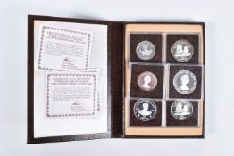 AN ASSORTMENT OF COINS, to include a set of four Turks and Caicos silver proof coins, with