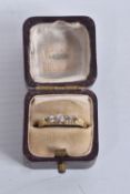 A FIVE STONE DIAMOND RING, yellow metal ring, set with five old cut diamonds, approximate total