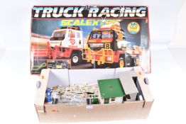 A BOXED SCALEXTRIC TRUCK RACING SET, No.C551, not tested, appears largely complete with both