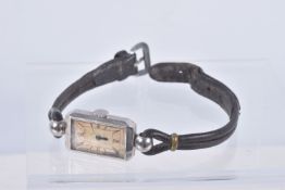 A 'JAEGER LE-COULTRE' LADYS WRISTWATCH, hand wound movement, discoloured rectangular dial, signed '