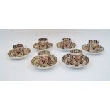 Six Derby Imari coffee cans and saucers, 19th century, with floral and foliate decoration with