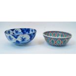 Two Japanese porcelain bowls, 19th/20th century, the first, blue and white, with scholars in