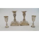 A pair of Victorian filled silver candlesticks, Sheffield, 1888, Hawksworth, Eyre & Co Ltd, with