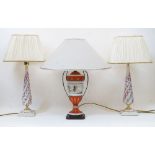 A pair of modern Italian Mangani ceramic table lamps, each with tapering shaft, decorated with