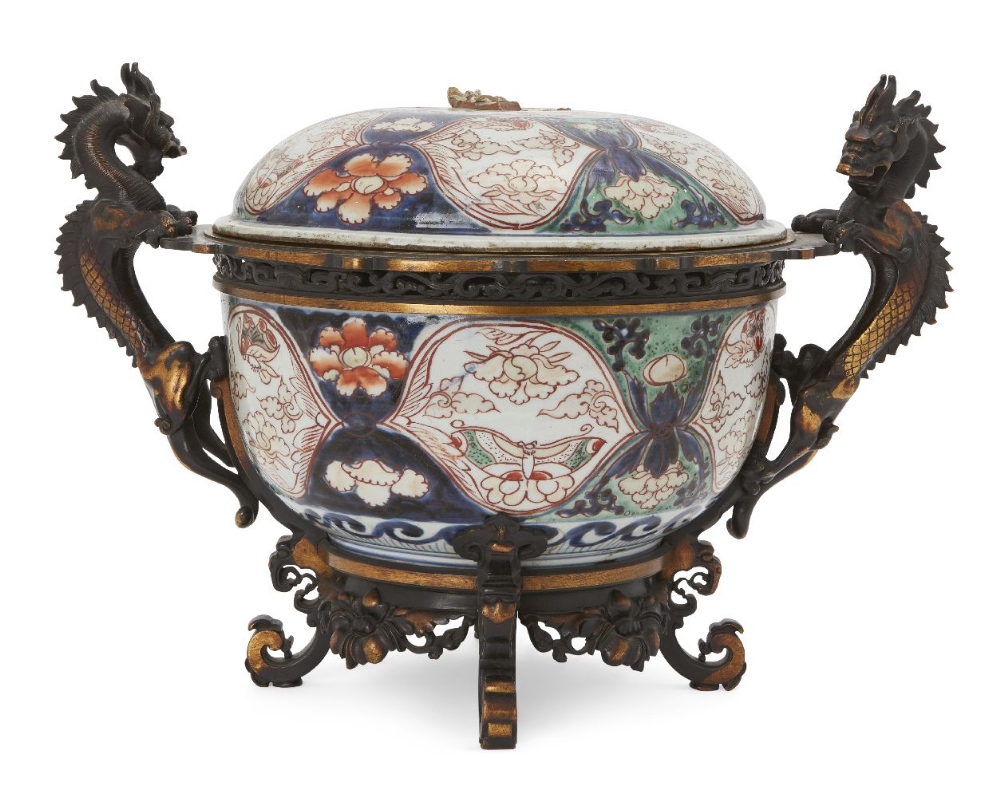 A large Japanese gilt bronze mounted Imari bowl and cover, 18th/19th century, painted in