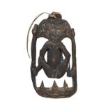 A Papua New Guinean figural carving, probably Sepik River, early 20th century, depicting two figures