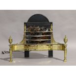 A George III style electric fire grate, late 20th century, brass and steel with urn shape finials,