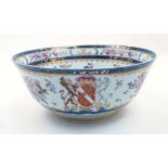 A Samson punch bowl, 19th century, decorated in Chinese export style with floral sprays and gilt