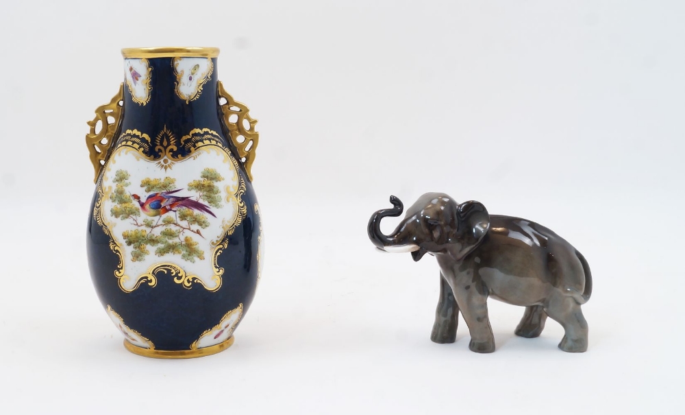 A Worcester style porcelain cobalt blue ground vase, late 19th century, with pierced twin handles