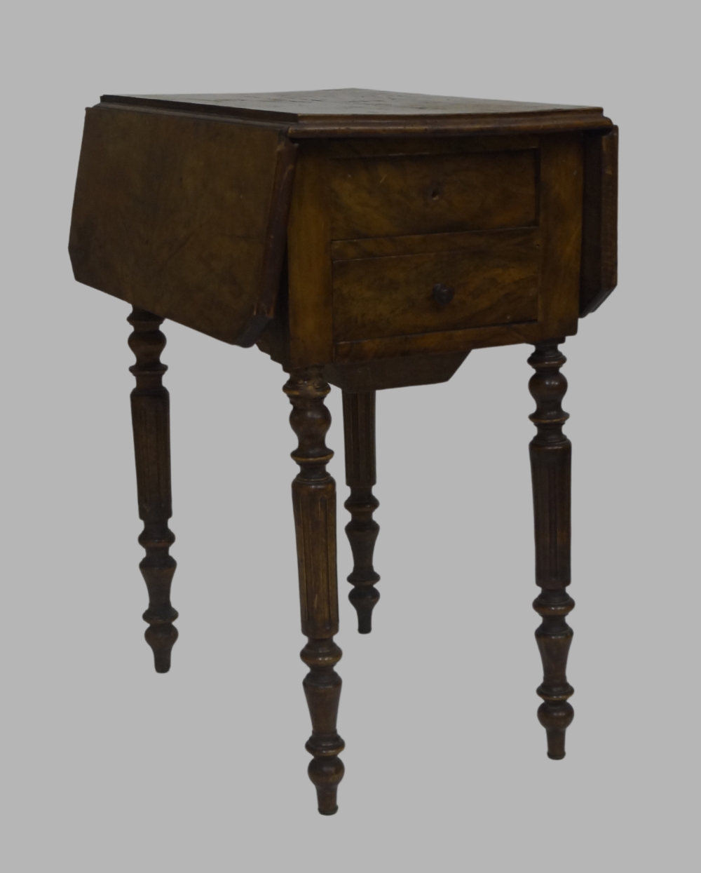 A walnut drop leaf work table, 19th century and later, with two drawer and cupboard door to the