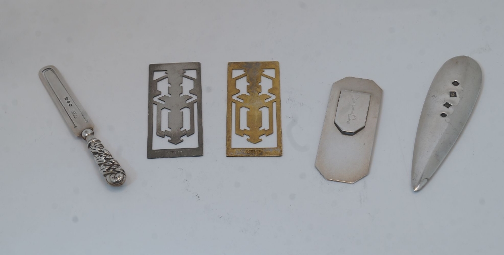 A small collection of silver and white metal bookmarks, to include: a silver example in the form