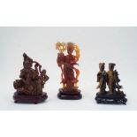 Three Chinese figurative hardstone carvings, 20th century, comprising a carnelian agate carved