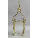 A brass framed ceiling lantern, 20th century, the four glass panels held by turned columns and