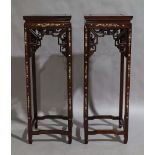 A pair of Chinese hardwood jardiniere stands, 20th century, with mother of pearl inlay, decorated