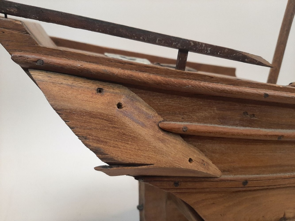 A large carved wood model of a Chinese Dhow, 20th century, having twin masts, at fault and missing - Image 7 of 10