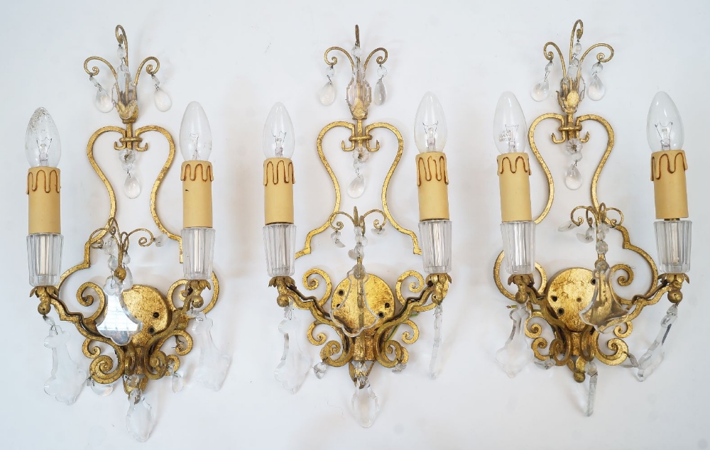 Six gilt metal twin branch wall appliques, late 20th century, with scrolling branches and glass