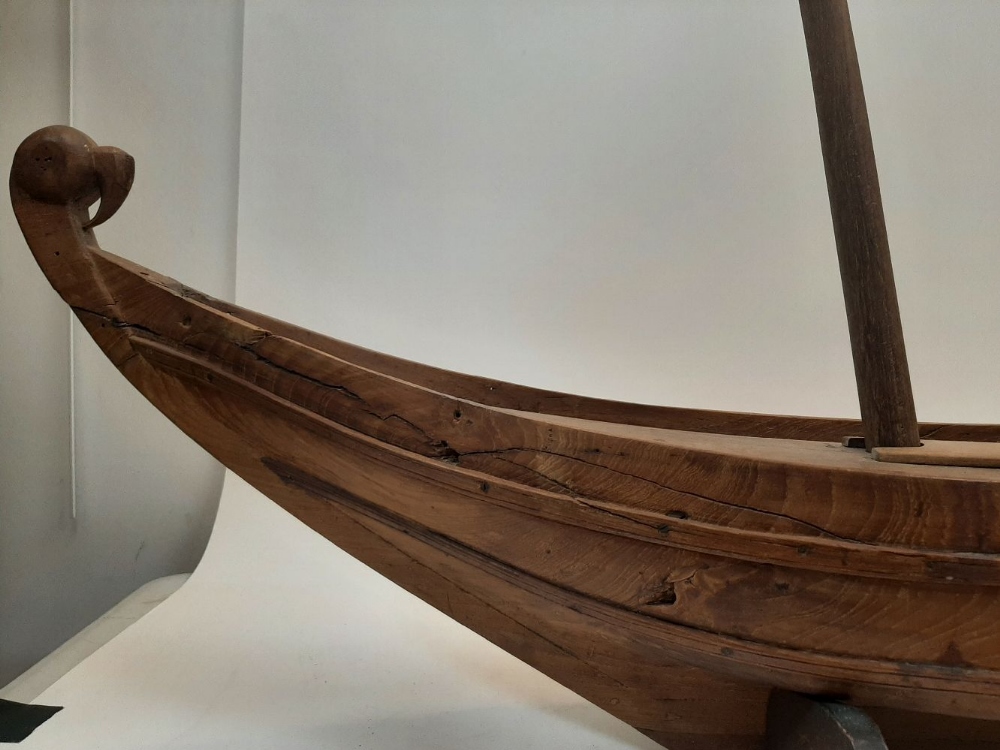 A large carved wood model of a Chinese Dhow, 20th century, having twin masts, at fault and missing - Image 9 of 10