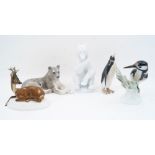 Five Continental porcelain models of animals and birds, comprising: a Berlin KPM porcelain