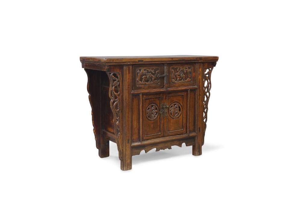 A Chinese elm side cabinet, early 20th century, the rectangular top above two drawers, carved with - Image 3 of 4