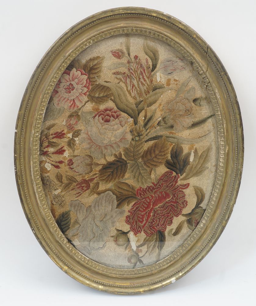 A collection of needlework panels, to include: an oval needlework panel depicting blossoming