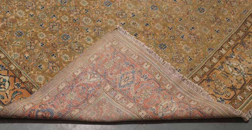A Persian Moud carpet, mid to late 20th century, central repeating geometric floral motifs, on a - Image 3 of 3