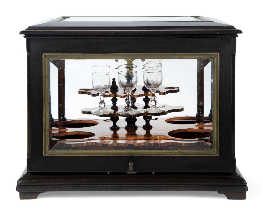A Napoleon III ebonised liqueur cabinet, probably by Paul Sormani, third quarter 19th century, the