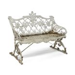 A Victorian style white-painted cast aluminium bench, 20th century, in the manner of