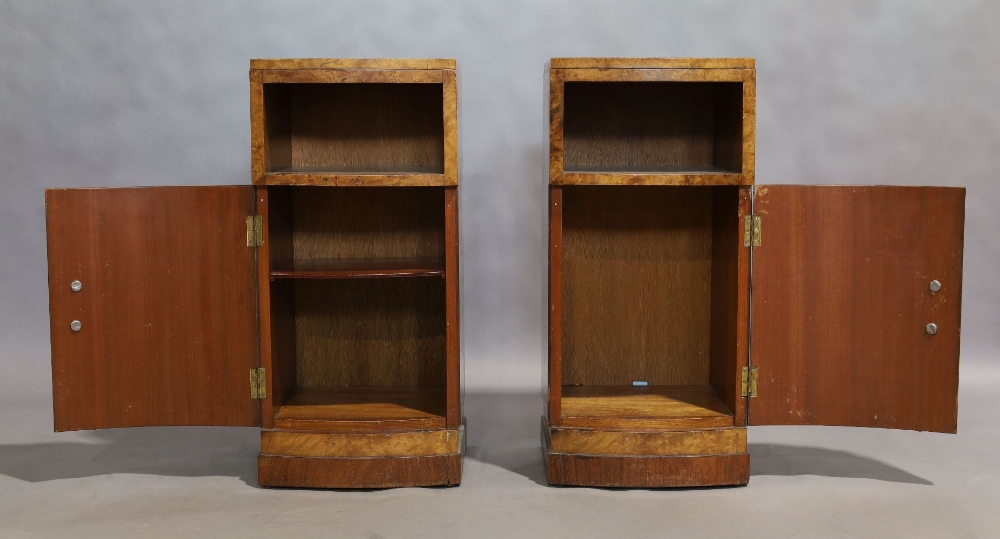A pair of Art Deco walnut bow fronted bedside cabinets, with open shelf above cupboard door, - Image 2 of 2