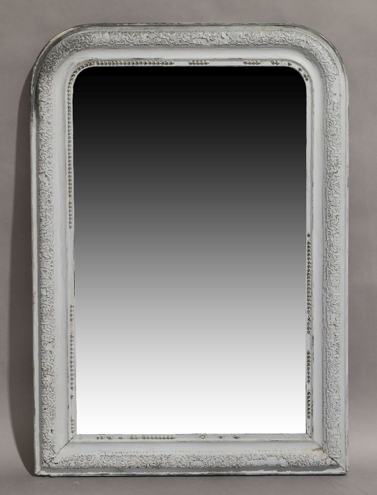 A Victorian over mantle mirror, circa 1860, the moulded rectangular frame with rounded top, floral