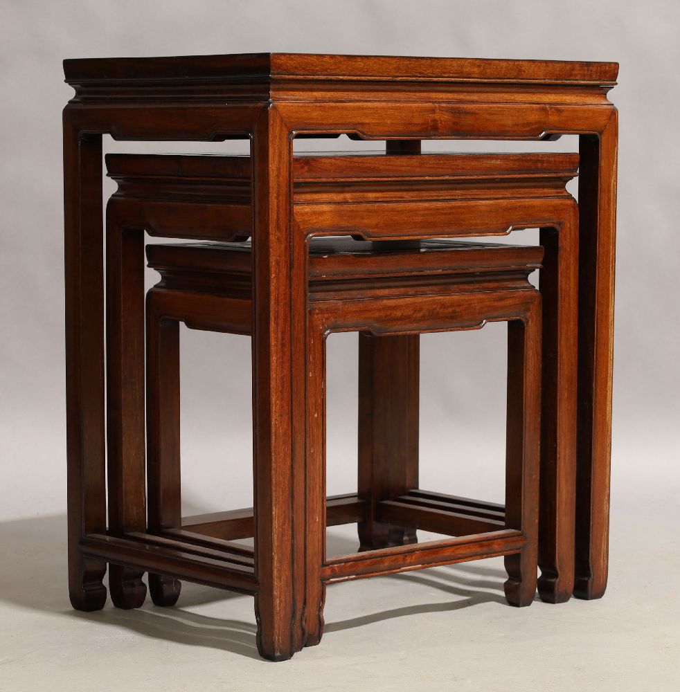 A Chinese hardwood nest of three tables, 20th century, 61cm high, 50cm wide, 36cm deep (3)light - Image 2 of 3