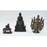 A group of three Chinese bronzes, early and mid-20th century, comprising a seated Buddha atop a