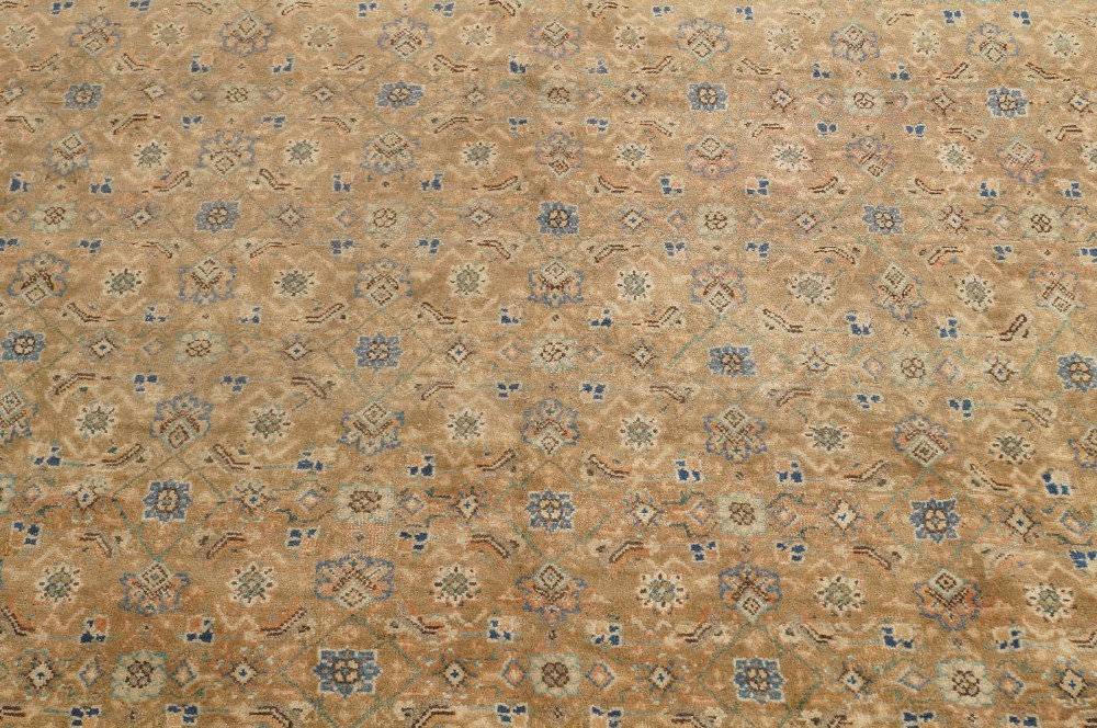 A Persian Moud carpet, mid to late 20th century, central repeating geometric floral motifs, on a - Image 2 of 3