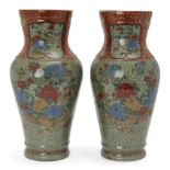 A pair of Chinese stoneware celadon vases, 19th century, each enamelled with peonies and