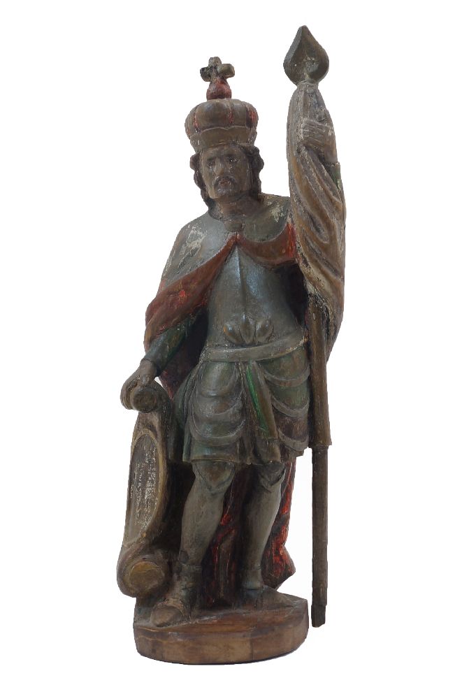 A Northern European polychrome painted figure, late 19th / early 20th century, wearing a crown and