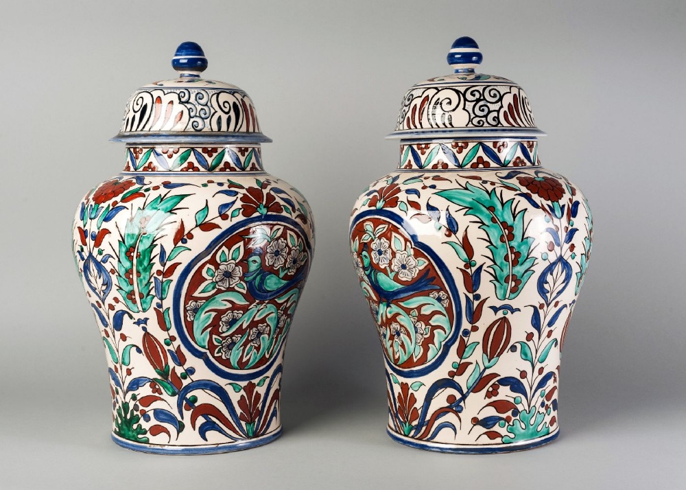 A pair of European pottery baluster jars and covers, in the Iznik style, 20th century, 42cm high (