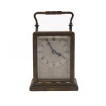 A French brass carriage timepiece, late 19th century, the brass case with swing handle and