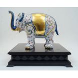 A modern Italian Manifattura Artistica le Porcellane model of an elephant, numbered 2405, retailed